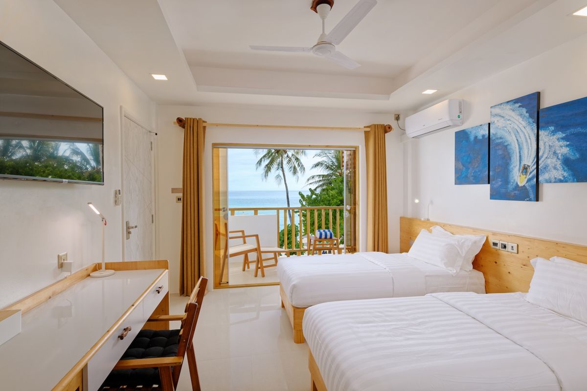 Sea-view room made up with twin beds